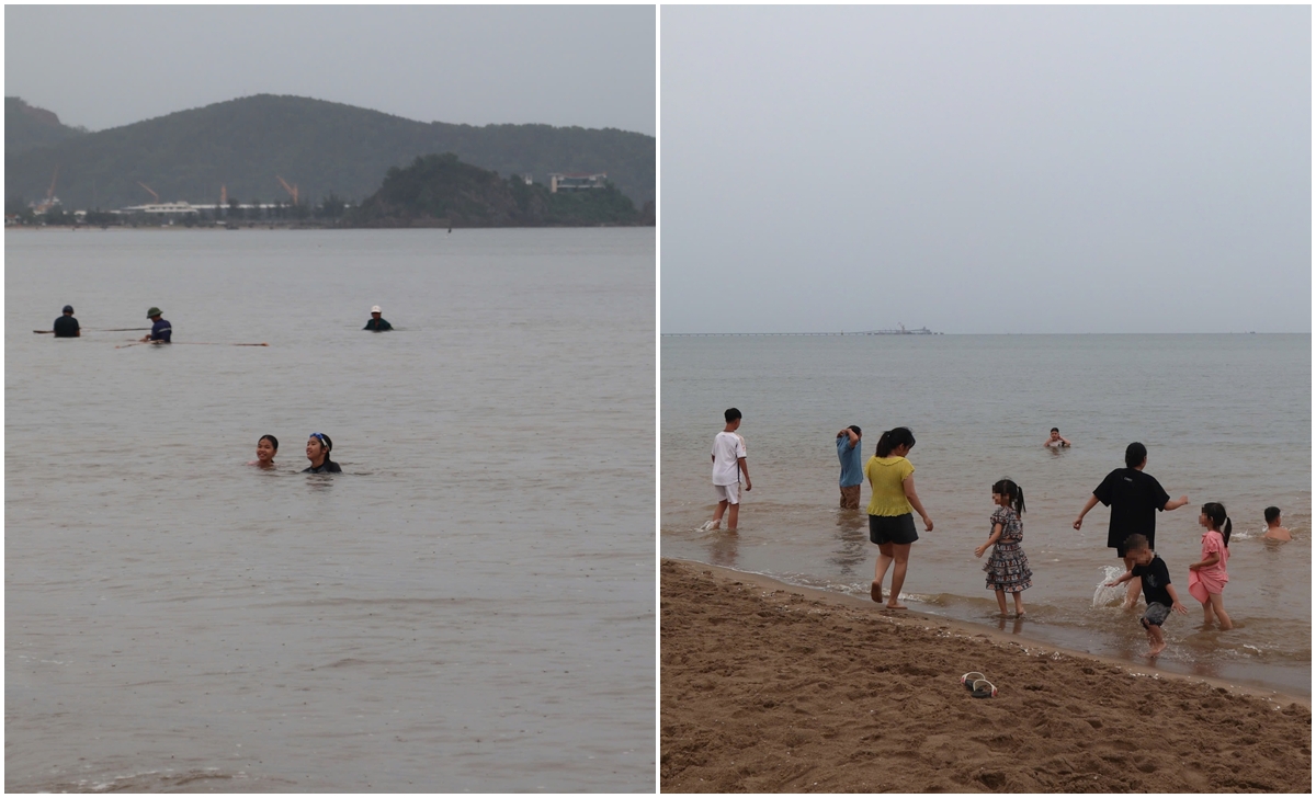 Nhiều du khách vẫn tắm biển Cửa Lò dù có lệnh cấm: “Bức xúc thật sự”